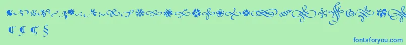 PoeticaSuppOrnaments Font – Blue Fonts on Green Background