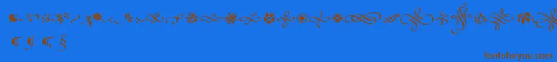 PoeticaSuppOrnaments Font – Brown Fonts on Blue Background