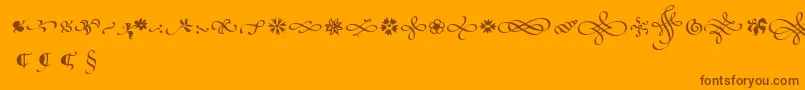 PoeticaSuppOrnaments Font – Brown Fonts on Orange Background