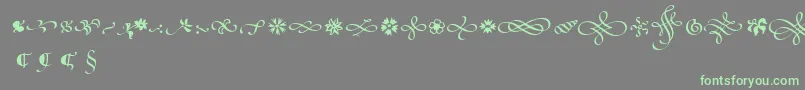 PoeticaSuppOrnaments Font – Green Fonts on Gray Background