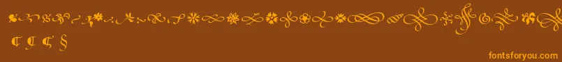 PoeticaSuppOrnaments Font – Orange Fonts on Brown Background
