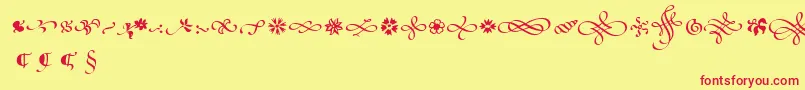 PoeticaSuppOrnaments Font – Red Fonts on Yellow Background