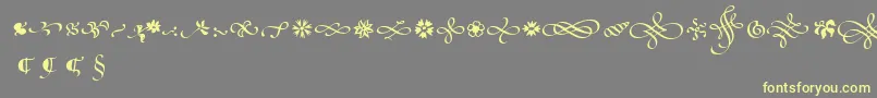 PoeticaSuppOrnaments Font – Yellow Fonts on Gray Background