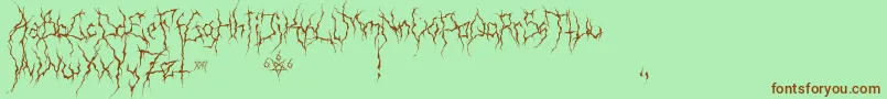 XxiiUltimateBlackMetal-Schriftart – Braune Schriften auf grünem Hintergrund