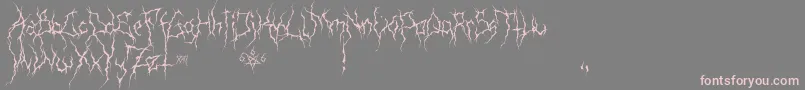 フォントXxiiUltimateBlackMetal – 灰色の背景にピンクのフォント