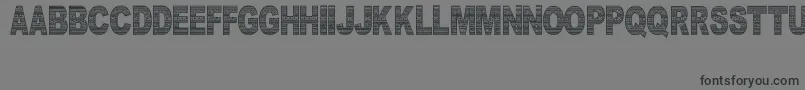 フォントDocallismeHasPattern – 黒い文字の灰色の背景