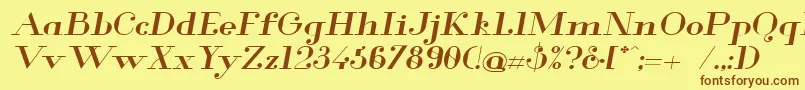 フォントGlamor Mediumextendeditalic – 茶色の文字が黄色の背景にあります。