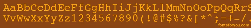 フォントNtcouriervkCyrillicNormaloblique – オレンジ色の文字が茶色の背景にあります。