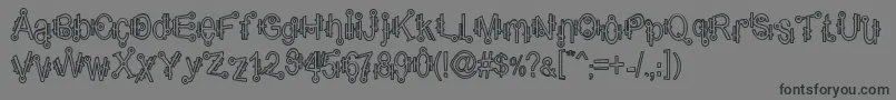 フォントShamanticsHollow – 黒い文字の灰色の背景
