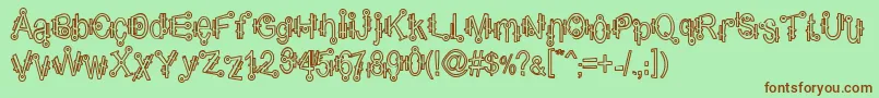 ShamanticsHollow Font – Brown Fonts on Green Background