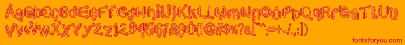 ShamanticsHollow Font – Red Fonts on Orange Background