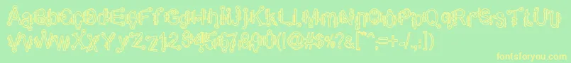 ShamanticsHollow Font – Yellow Fonts on Green Background