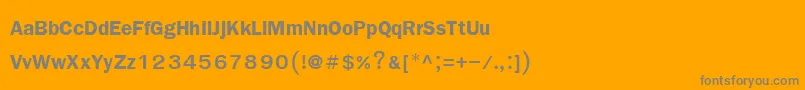 FreesiaupcBold-fontti – harmaat kirjasimet oranssilla taustalla
