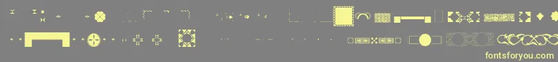 Шрифт Pfornmtreasures3Layer3 – жёлтые шрифты на сером фоне
