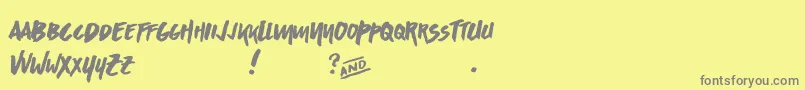 フォントAsphaltsDisplayPersonalUse – 黄色の背景に灰色の文字