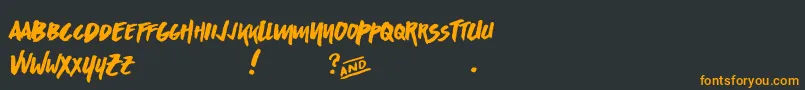 フォントAsphaltsDisplayPersonalUse – 黒い背景にオレンジの文字