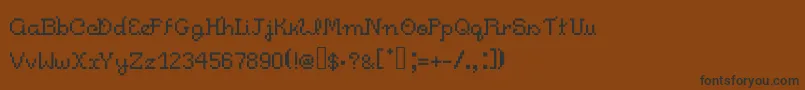 Pixelitocm-Schriftart – Schwarze Schriften auf braunem Hintergrund
