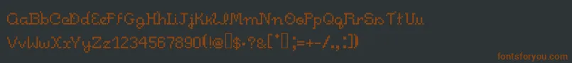 Czcionka Pixelitocm – brązowe czcionki na czarnym tle