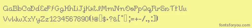 Czcionka Pixelitocm – szare czcionki na żółtym tle