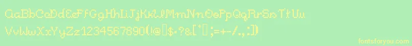 Czcionka Pixelitocm – żółte czcionki na zielonym tle