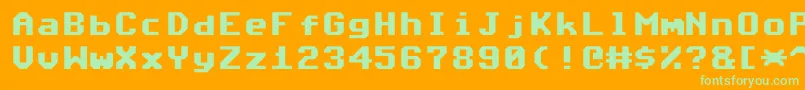 CommodoreAngledV1.2-Schriftart – Grüne Schriften auf orangefarbenem Hintergrund