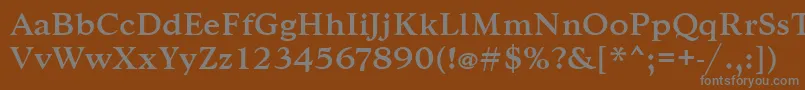 Goudytmed-fontti – harmaat kirjasimet ruskealla taustalla