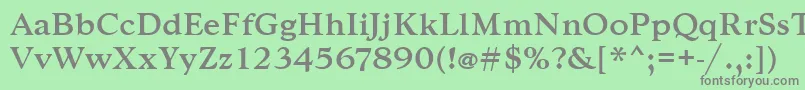 フォントGoudytmed – 緑の背景に灰色の文字