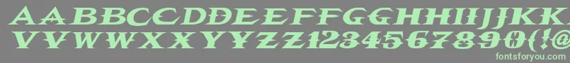 フォントVtcbelialsbladeitalic – 灰色の背景に緑のフォント