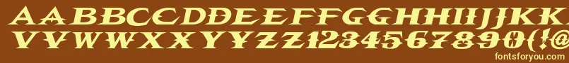 フォントVtcbelialsbladeitalic – 黄色のフォント、茶色の背景