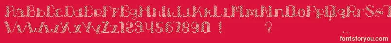 Czcionka LapiahTigoTypeface – zielone czcionki na czerwonym tle