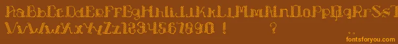 フォントLapiahTigoTypeface – オレンジ色の文字が茶色の背景にあります。