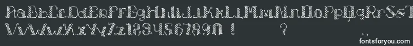 Шрифт LapiahTigoTypeface – белые шрифты на чёрном фоне