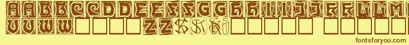 フォントKinigsteincaps – 茶色の文字が黄色の背景にあります。