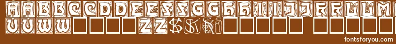 Kinigsteincaps-fontti – valkoiset fontit ruskealla taustalla