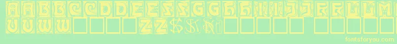 Kinigsteincaps Font – Yellow Fonts on Green Background