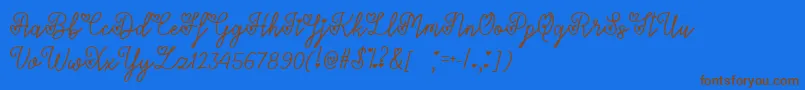LoversInFebruaryTtf-Schriftart – Braune Schriften auf blauem Hintergrund