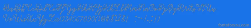 LoversInFebruaryTtf-fontti – harmaat kirjasimet sinisellä taustalla