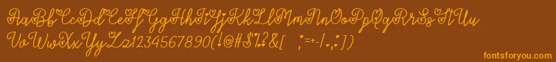 LoversInFebruaryTtf-Schriftart – Orangefarbene Schriften auf braunem Hintergrund
