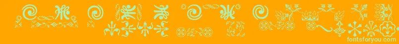Ornamentsvillage Font – Green Fonts on Orange Background
