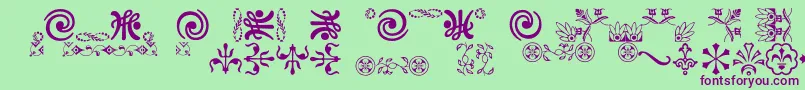 Ornamentsvillage Font – Purple Fonts on Green Background