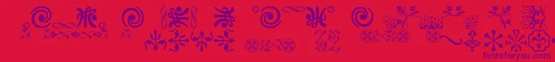 Ornamentsvillage Font – Purple Fonts on Red Background
