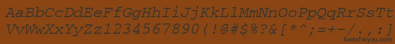 Fonte CourierpsOblique – fontes pretas em um fundo marrom