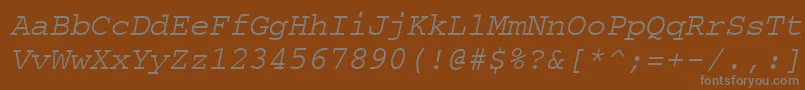 Czcionka CourierpsOblique – szare czcionki na brązowym tle