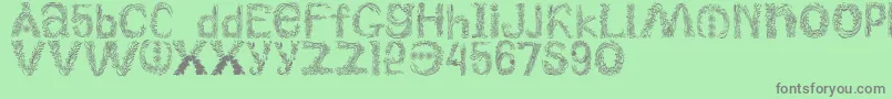 Plantsletters-Schriftart – Graue Schriften auf grünem Hintergrund