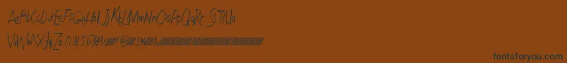 Czcionka Faultlinedt – czarne czcionki na brązowym tle