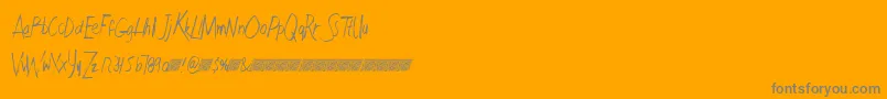 Czcionka Faultlinedt – szare czcionki na pomarańczowym tle
