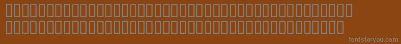 Шрифт McsAlmaalimHighDecoOutline – серые шрифты на коричневом фоне