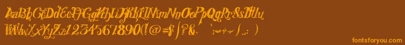 RoyalVanity Font – Orange Fonts on Brown Background