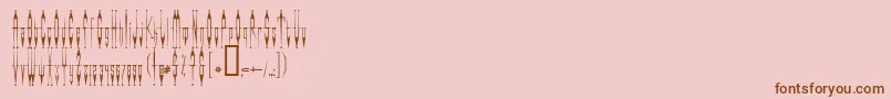 Evilclow Font – Brown Fonts on Pink Background