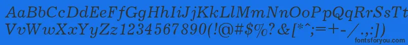 JournalItalic Font – Black Fonts on Blue Background